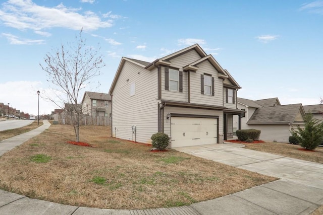 view of front facade featuring concrete driveway, an attached garage, and a front yard