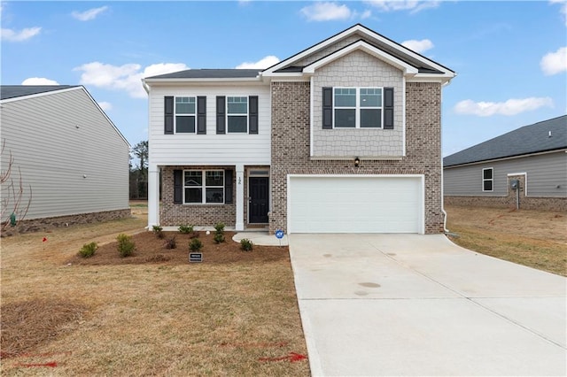 view of front of house with a garage and a front lawn