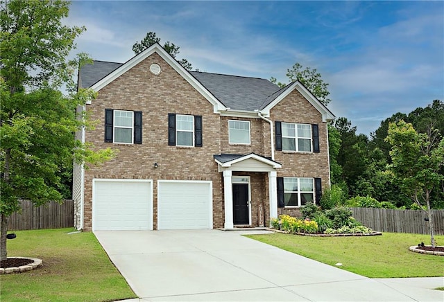 735 Sweethaven Ln, Loganville, GA 30052 - view of front facade with concrete driveway, a garage, and brick siding