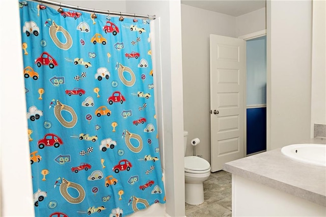 735 Sweethaven Ln, Loganville, GA 30052 - full bath with toilet, vanity, a shower with curtain, and tile patterned flooring