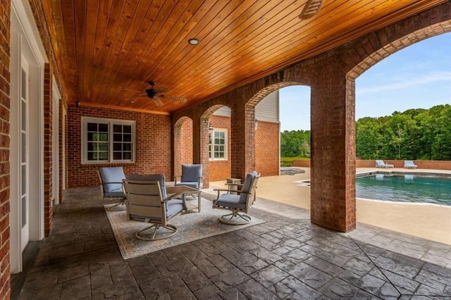 833 Hines Rd, Moreland, GA 30259 - view of patio / terrace featuring a ceiling fan, an outdoor hangout area, and an outdoor pool