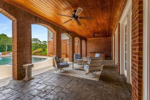 833 Hines Rd, Moreland, GA 30259 - view of patio featuring ceiling fan and an outdoor pool