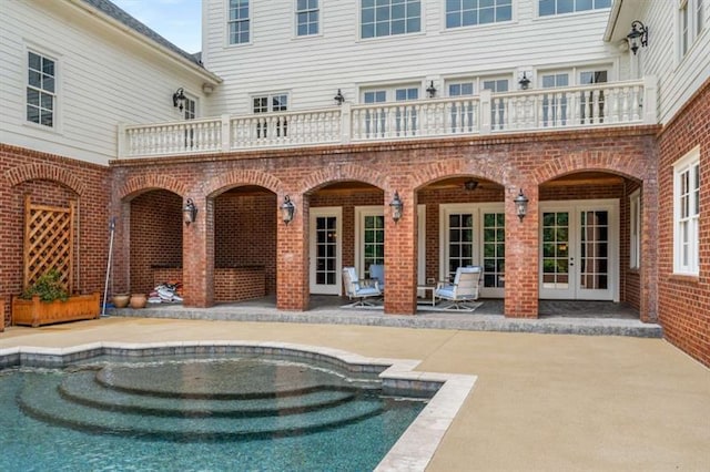 833 Hines Rd, Moreland, GA 30259 - outdoor pool with french doors and a patio area