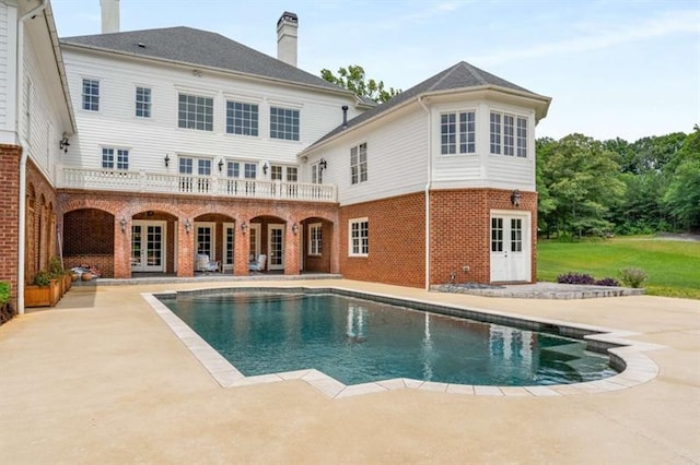 833 Hines Rd, Moreland, GA 30259 - rear view of house featuring french doors, brick siding, and a patio