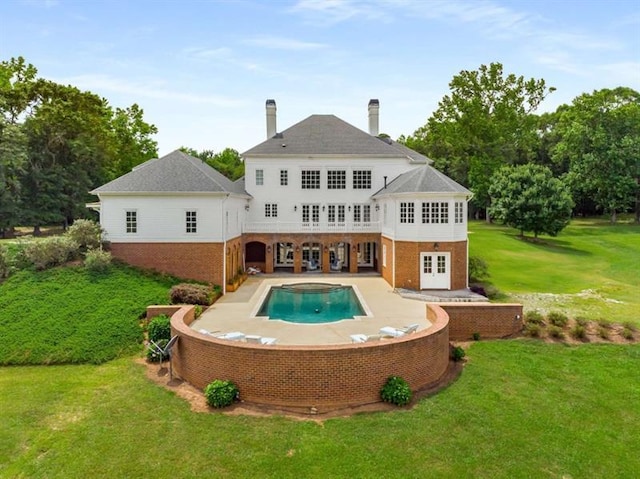 833 Hines Rd, Moreland, GA 30259 - back of house featuring french doors, brick siding, a yard, and a hot tub