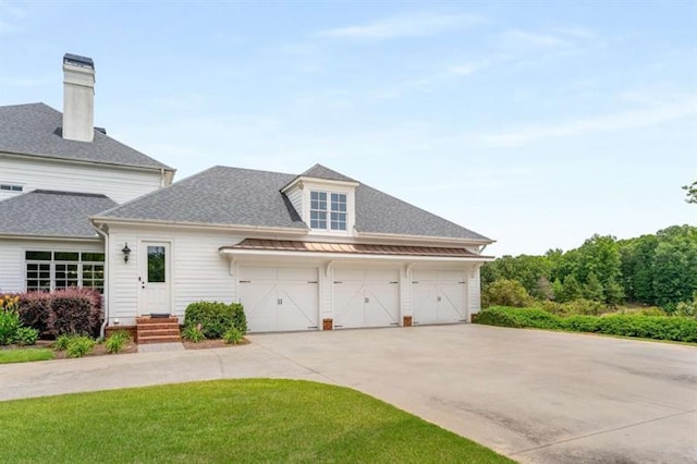 833 Hines Rd, Moreland, GA 30259 - view of front of home featuring driveway, an attached garage, a shingled roof, and a front yard