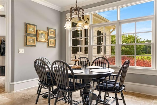 833 Hines Rd, Moreland, GA 30259 - dining space featuring stone tile flooring, a chandelier, and ornamental molding