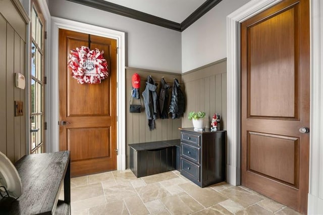 833 Hines Rd, Moreland, GA 30259 - mudroom with crown molding, light stone finish floors, and wainscoting