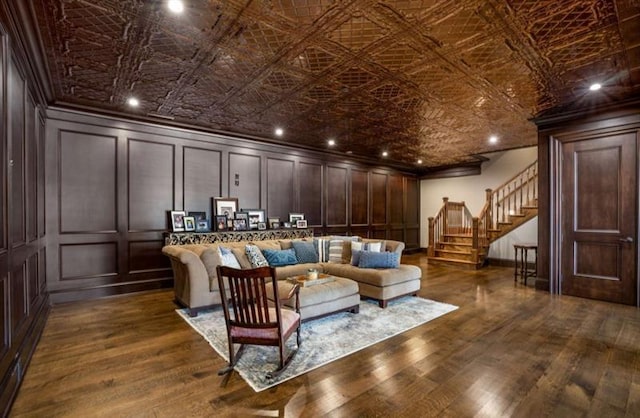 833 Hines Rd, Moreland, GA 30259 - living room with a decorative wall, an ornate ceiling, dark wood-style floors, stairway, and recessed lighting