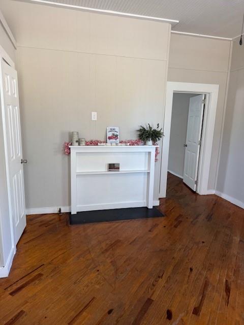 interior space with dark wood-type flooring