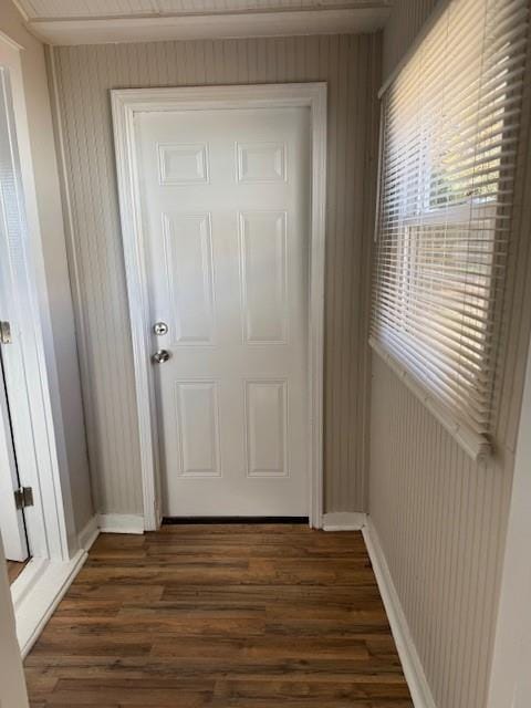 doorway to outside with dark hardwood / wood-style floors