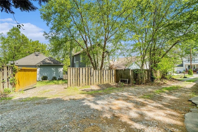 view of yard featuring fence
