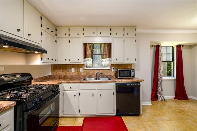 3645 Shrewsbury Ct, Snellville, GA 30039 - kitchen featuring black appliances, under cabinet range hood, white cabinets, tasteful backsplash, and ornamental molding