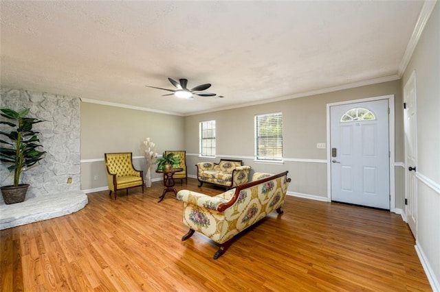 3645 Shrewsbury Ct, Snellville, GA 30039 - living area featuring wood finished floors, ceiling fan, ornamental molding, and a textured ceiling
