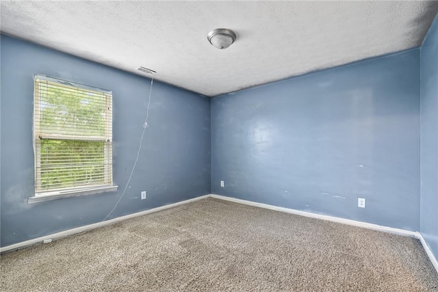 1212 Ashton Park Dr, Lawrenceville, GA 30045 - unfurnished room featuring carpet flooring, baseboards, and a textured ceiling