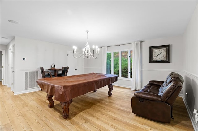 playroom featuring light hardwood / wood-style flooring and billiards