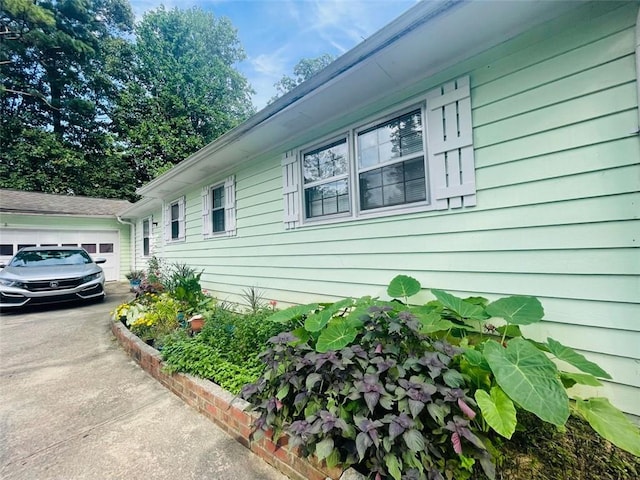 view of home's exterior with a garage