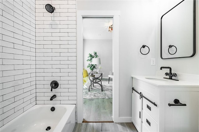 754 Fayetteville Rd SE, Atlanta, GA 30316 - bathroom with vanity, wood finished floors, and washtub / shower combination