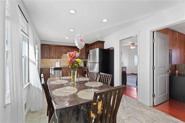 dining area featuring light tile patterned floors, visible vents, and recessed lighting