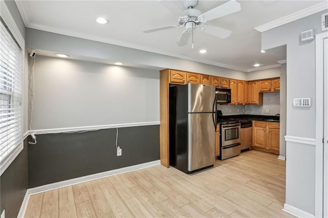 kitchen featuring sink, ornamental molding, stainless steel appliances, light hardwood / wood-style floors, and backsplash