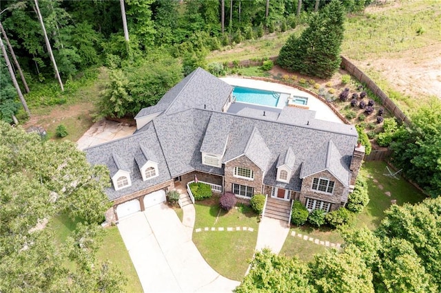 view from above of property with a pool area