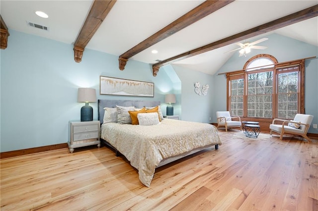 bedroom featuring light wood-style floors, baseboards, arched walkways, recessed lighting, and ceiling fan