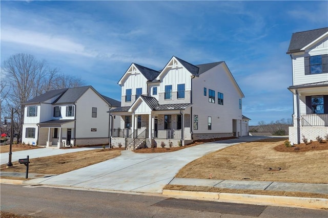 view of front of property with a garage and covered porch