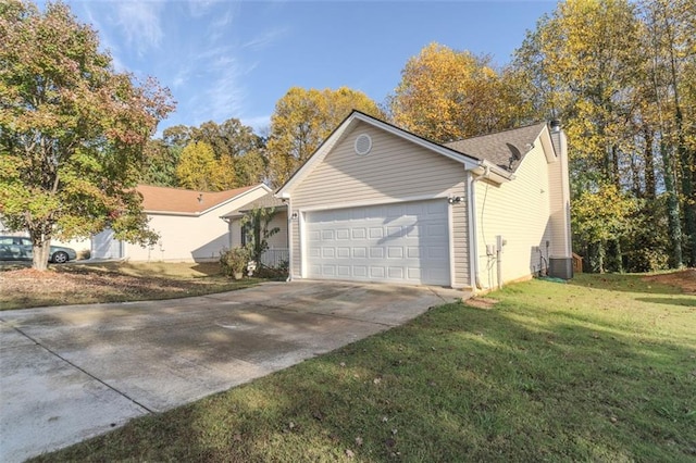 exterior space with a garage, cooling unit, and a front yard