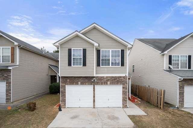 view of front of property with a garage