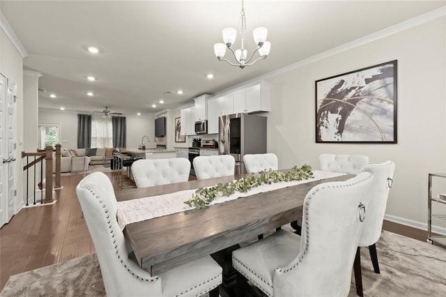 2227 Foley Park St, Snellville, GA 30078 - dining room featuring ornamental molding, wood finished floors, recessed lighting, a chandelier, and ceiling fan
