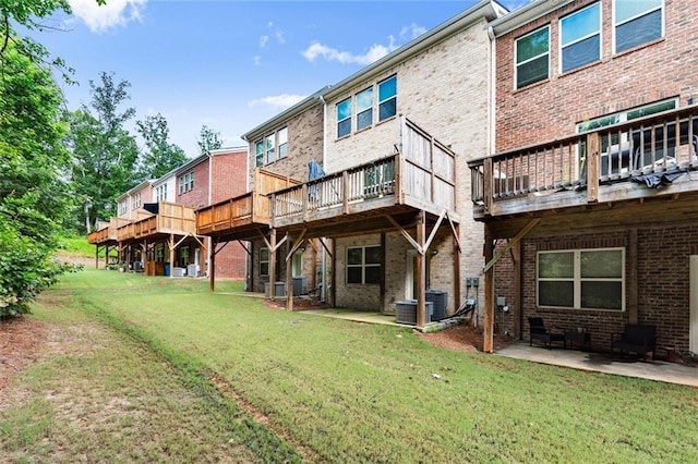 2227 Foley Park St, Snellville, GA 30078 - back of house with brick siding and a lawn