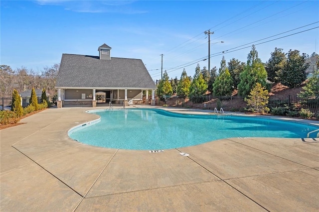 2227 Foley Park St, Snellville, GA 30078 - view of swimming pool featuring a patio area