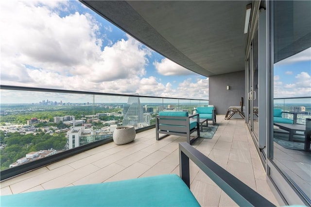 balcony featuring a city view