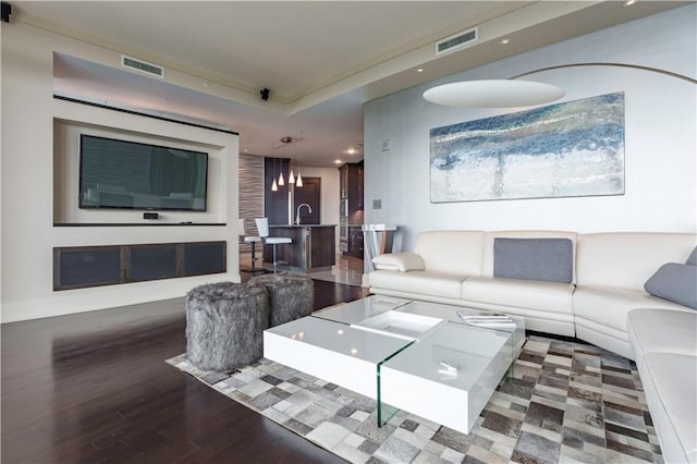 living room featuring wood finished floors and recessed lighting