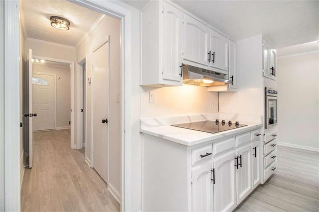 kitchen with crown molding, light hardwood / wood-style flooring, white cabinetry, black electric cooktop, and stainless steel oven