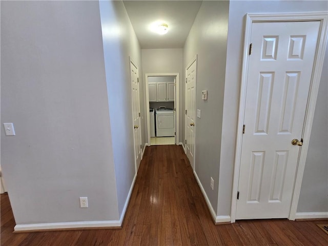 3773 Summer Rose Dr, Atlanta, GA 30341 - hall featuring washing machine and dryer, dark wood-type flooring, and baseboards
