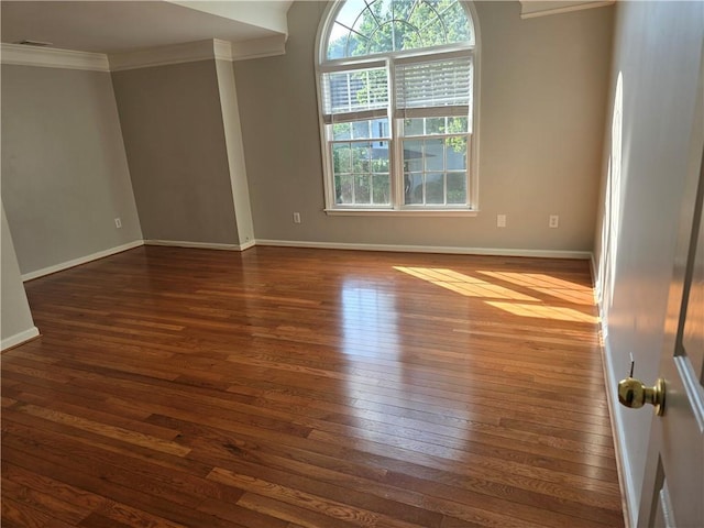 3773 Summer Rose Dr, Atlanta, GA 30341 - spare room with crown molding, dark wood finished floors, and baseboards