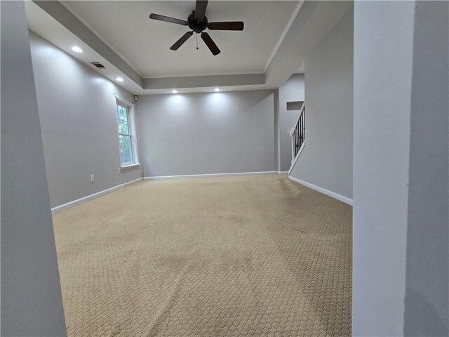 3773 Summer Rose Dr, Atlanta, GA 30341 - carpeted spare room featuring ceiling fan, stairs, a raised ceiling, baseboards, and recessed lighting