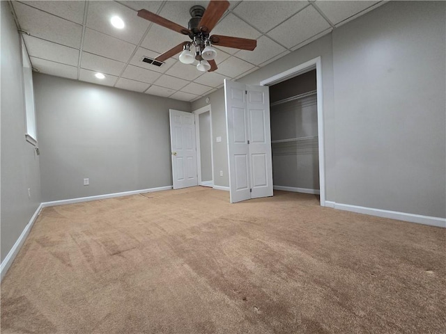 3773 Summer Rose Dr, Atlanta, GA 30341 - unfurnished bedroom with carpet, a paneled ceiling, baseboards, a closet, and a ceiling fan