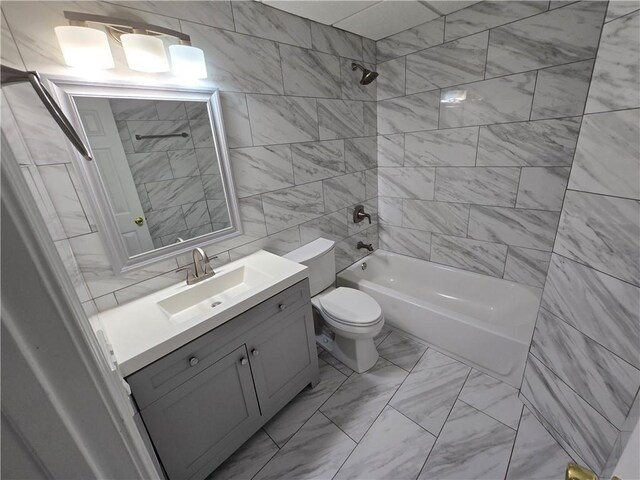 3773 Summer Rose Dr, Atlanta, GA 30341 - full bath featuring toilet, vanity, shower / washtub combination, tile walls, and marble finish floors