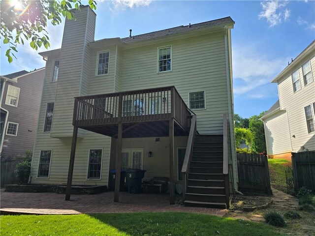 3773 Summer Rose Dr, Atlanta, GA 30341 - rear view of house with stairway, a deck, a patio, and a chimney