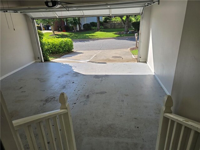 3773 Summer Rose Dr, Atlanta, GA 30341 - garage with baseboards and a garage door opener