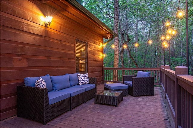 wooden deck featuring an outdoor living space