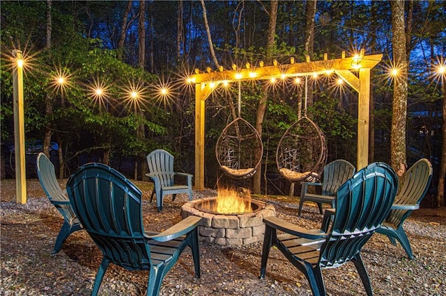 view of patio with a fire pit