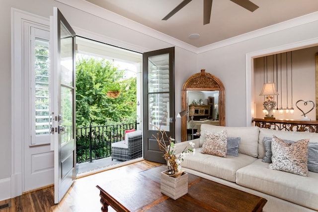 3734 Paige Way NE Unit 10, Atlanta, GA 30319 - living area featuring ceiling fan, healthy amount of natural light, wood finished floors, and ornamental molding