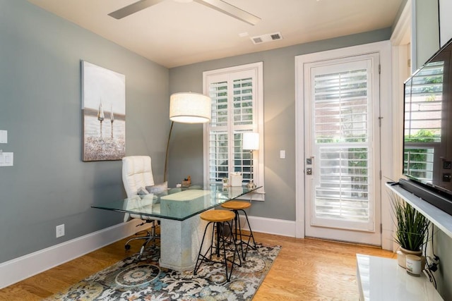 3734 Paige Way NE Unit 10, Atlanta, GA 30319 - dining room with ceiling fan, light wood finished floors, a desk, and baseboards