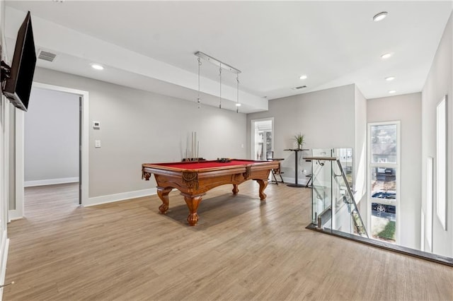 rec room with pool table, a healthy amount of sunlight, and light wood-type flooring