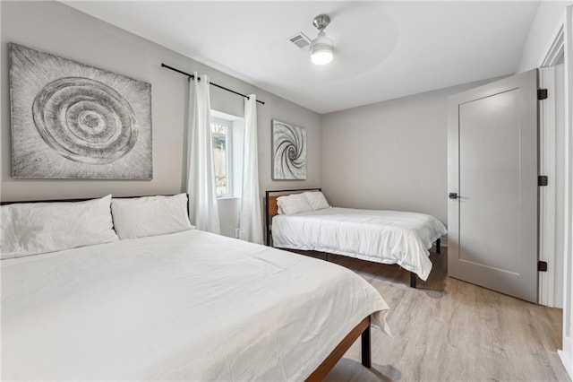 bedroom featuring ceiling fan and light wood-type flooring