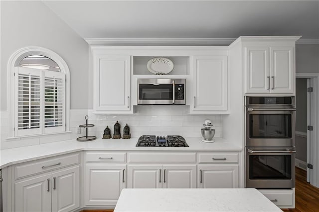 14270 Morning Mountain Way, Milton, GA 30004 - kitchen featuring appliances with stainless steel finishes, white cabinetry, light countertops, and open shelves