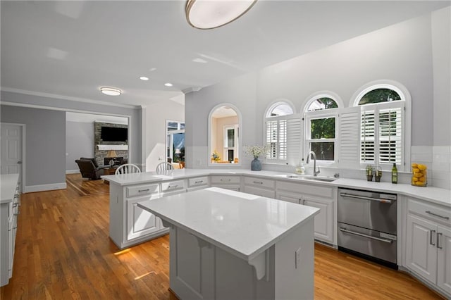14270 Morning Mountain Way, Milton, GA 30004 - kitchen with a center island, stainless steel dishwasher, light countertops, healthy amount of natural light, and recessed lighting